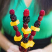 person holding Fruit and Cheese Kabobs