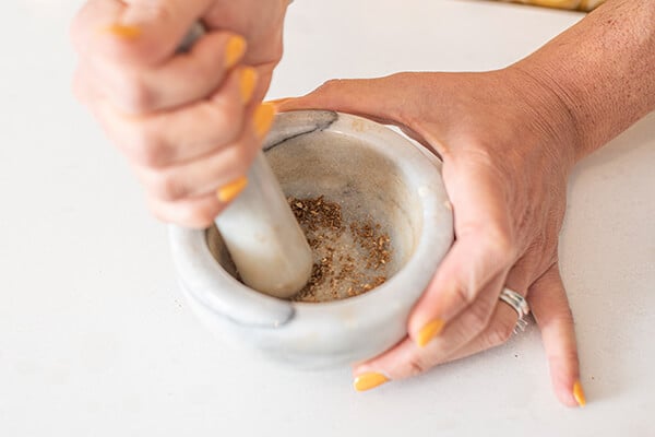 breaking down spices mortar and pestle