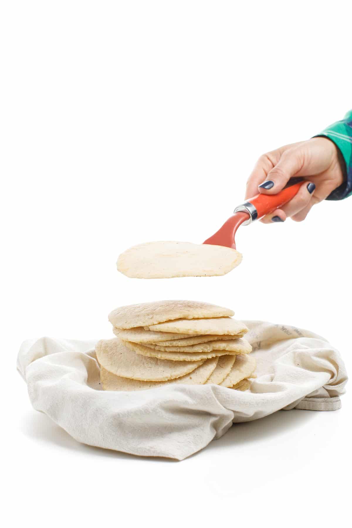 stacking homemade corn tortillas