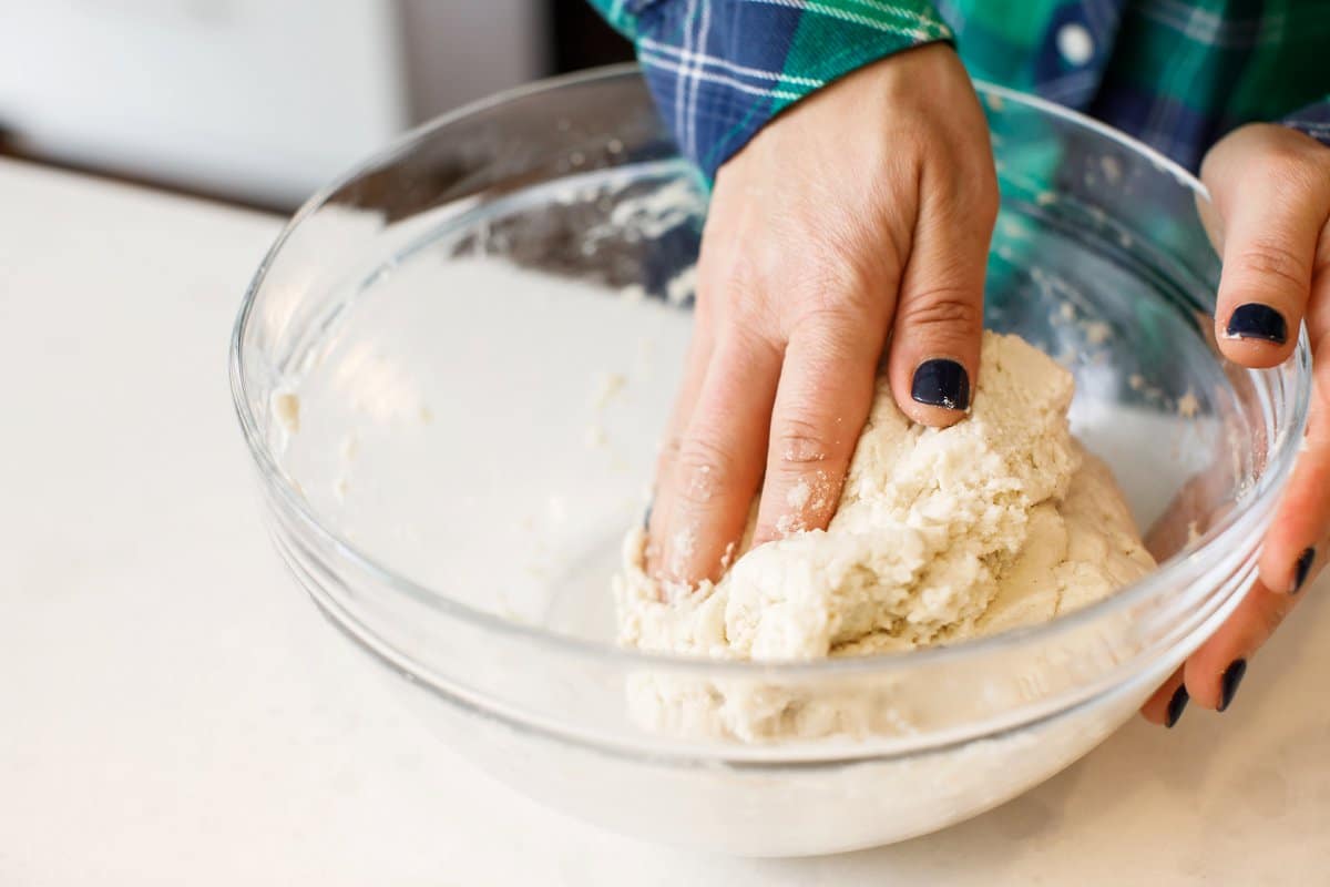 kneading corn tortilla dough