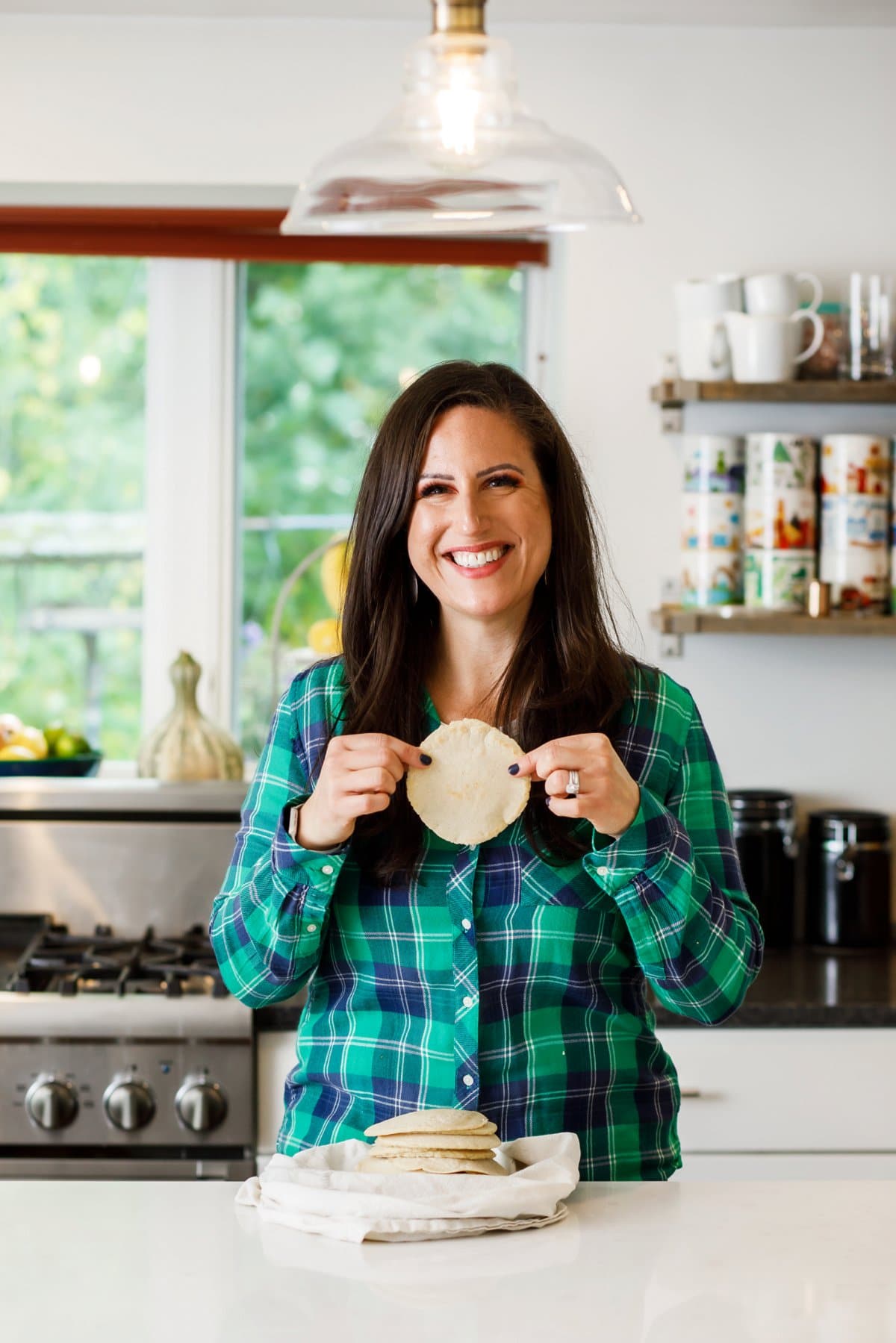 Liz holding corn tortilla