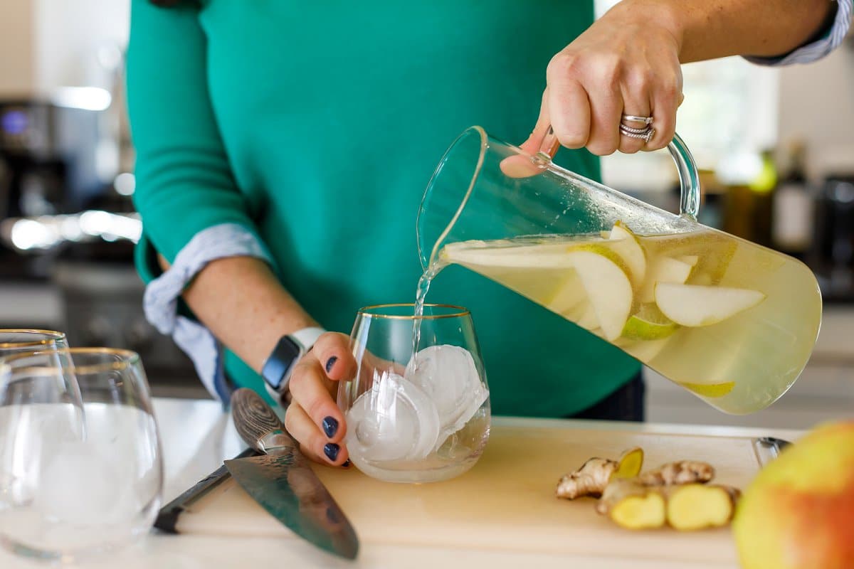 Liz pouring Pear Moscow Mule