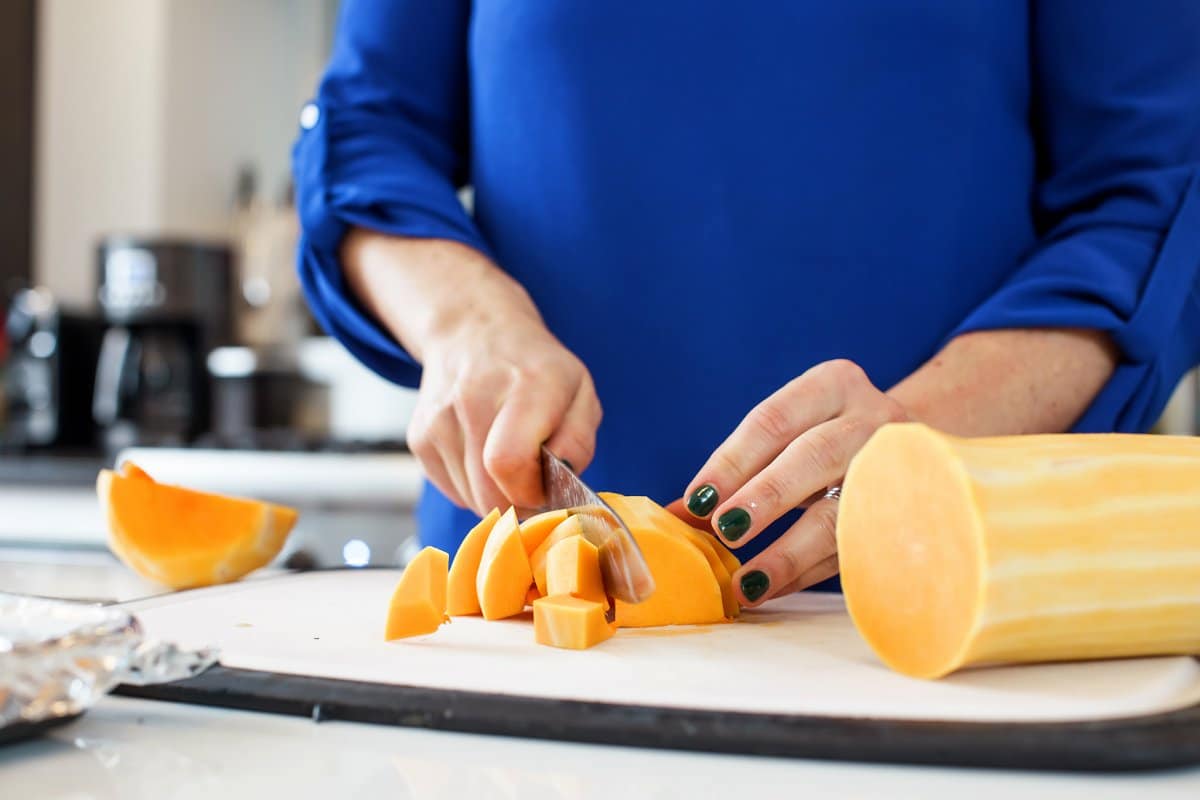 Liz cutting butternut squash