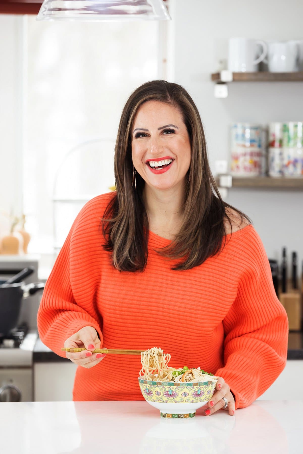 Liz eating spicy chicken ramen