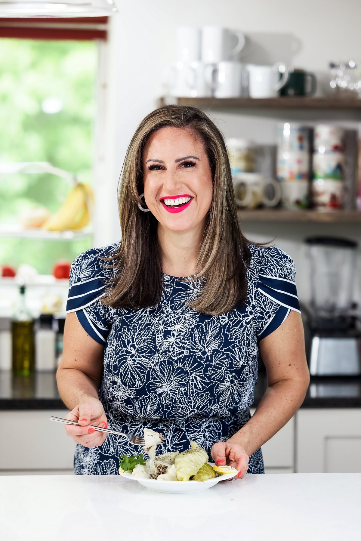 person eating cabbage rolls