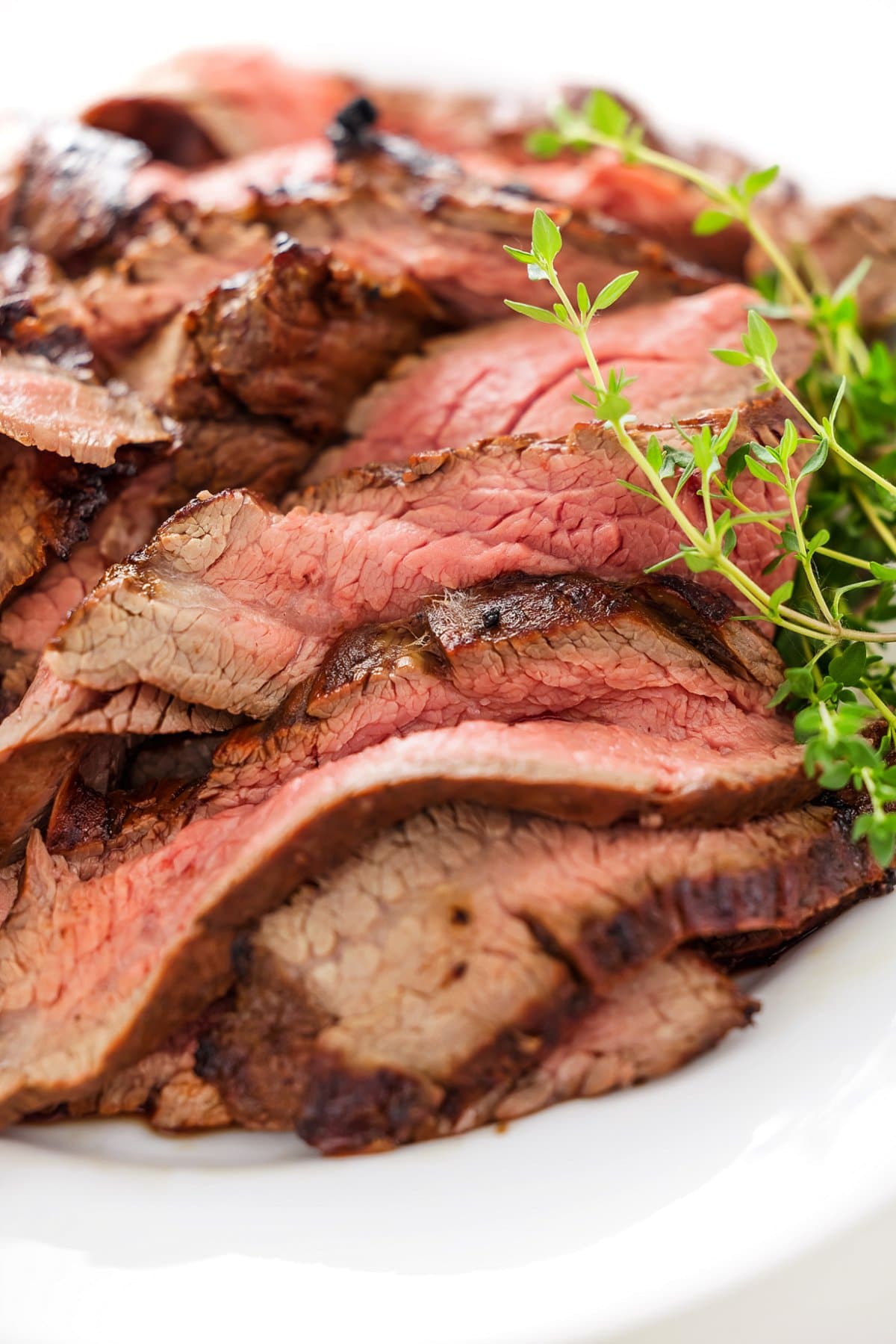 Plate of garlic soy marinated flank steak