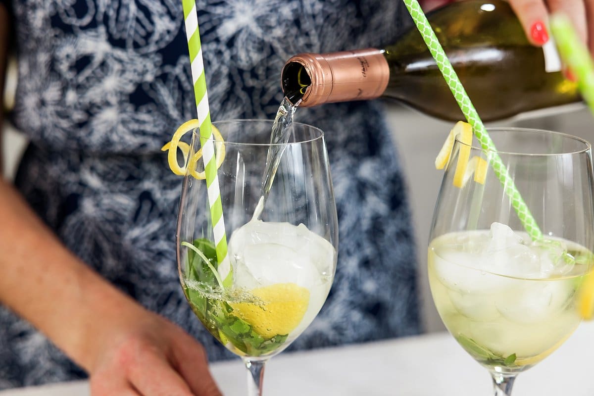 Pouring white wine for spritzer
