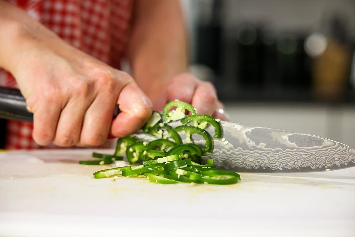 Liz cutting a jalapeno