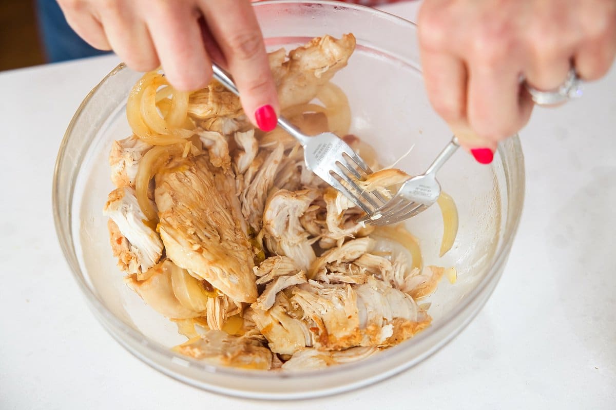 Liz shredding chicken.