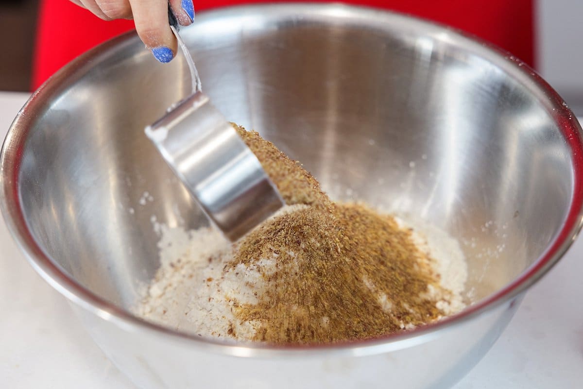 Flax seed meal added to bowl