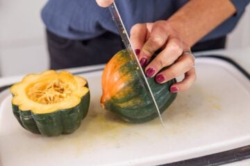 cutting an acorn squash