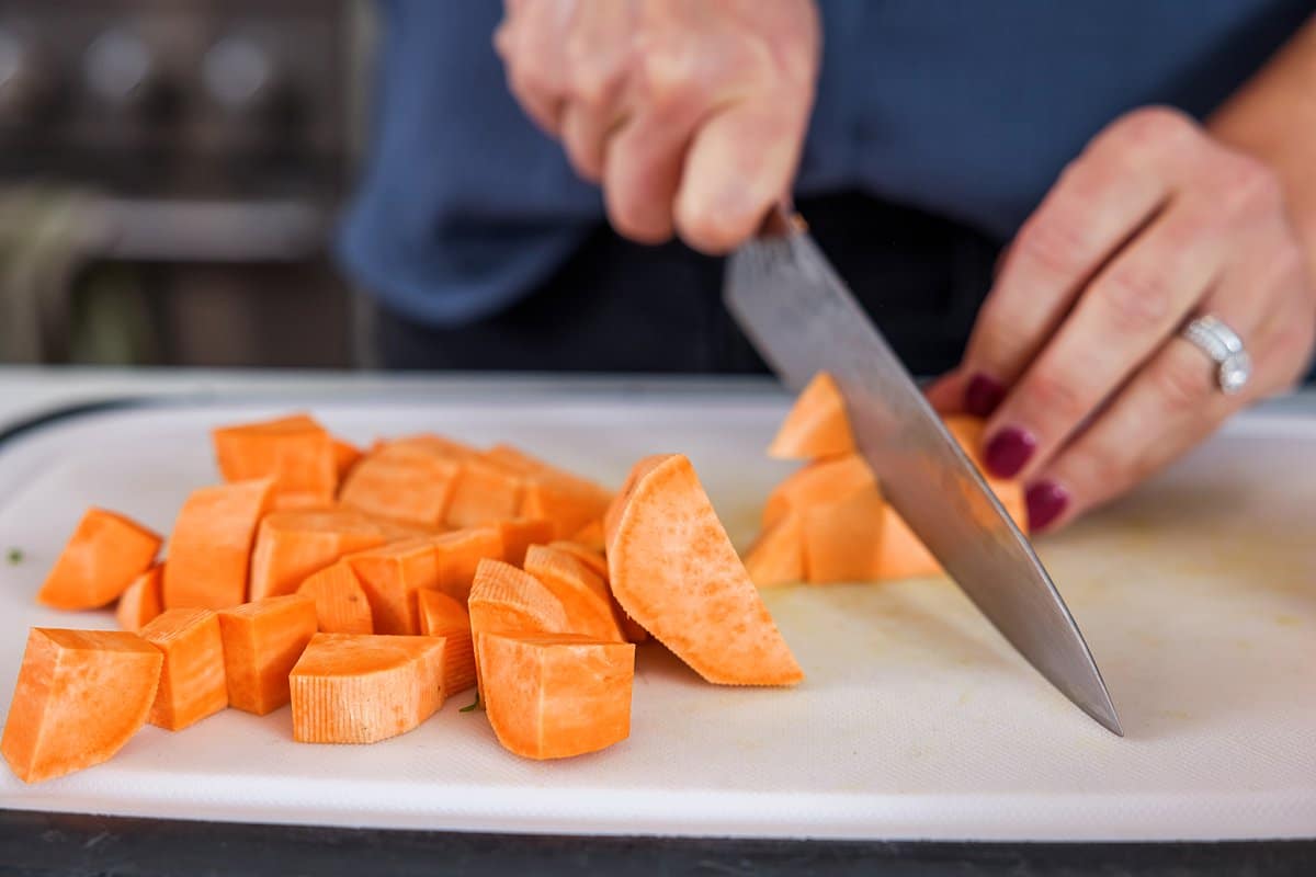 Liz cutting sweet potato
