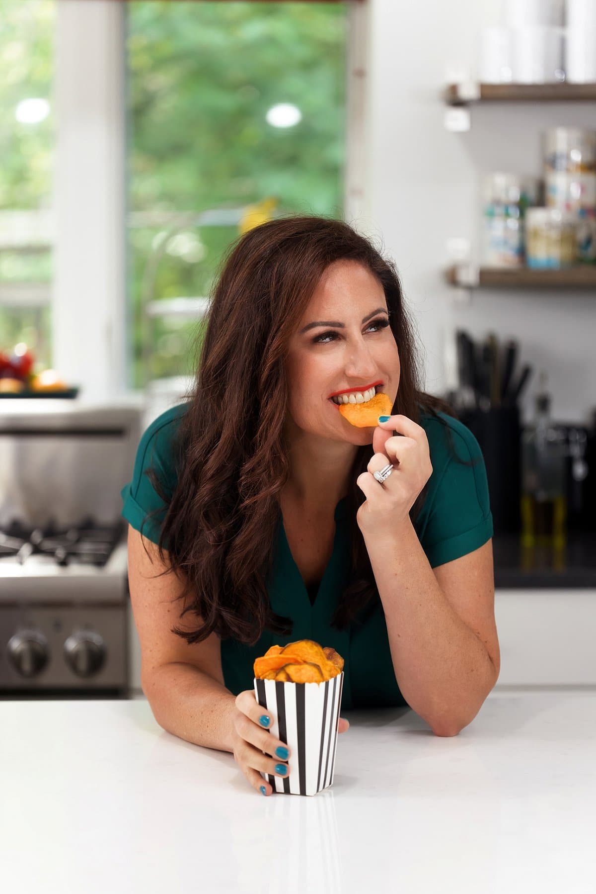 Liz eating sweet potato chips