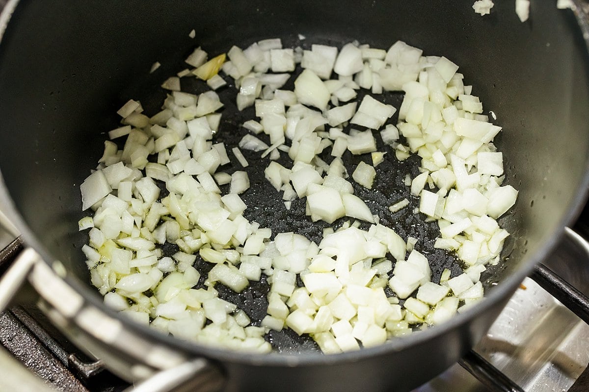 onions cooking in a pan
