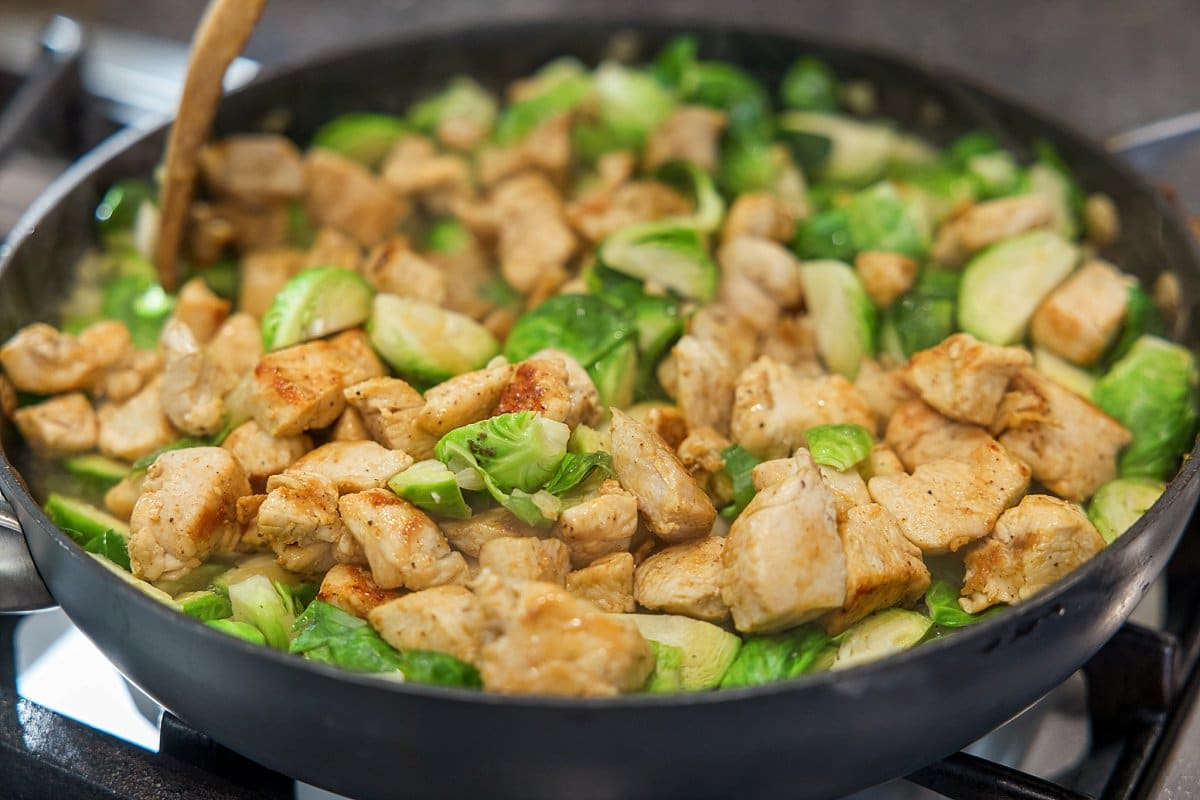 A pan filled with meat and vegetables