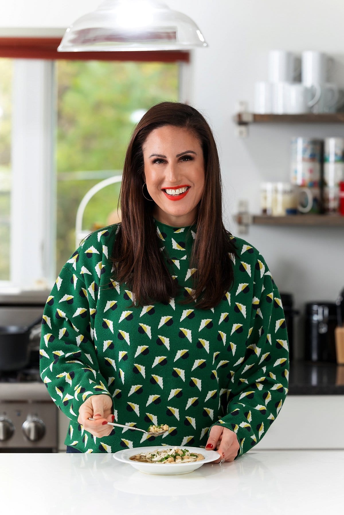 Liz eating Chicken and Chickpea Soup with Bulgur Wheat.