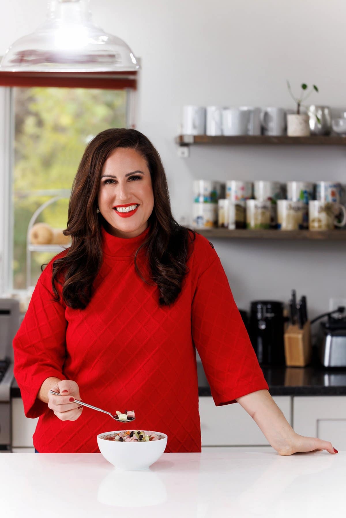 Liz eating slow cooker ham and bean soup.