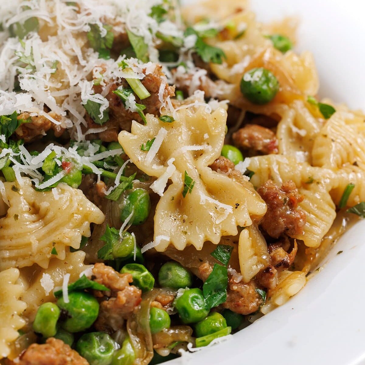 Sausage Pesto Pasta with Caramelized Onions and Peas