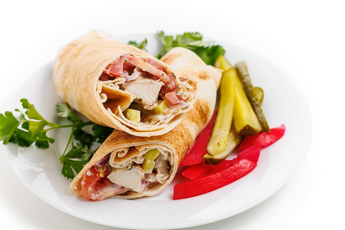 Chicken shawarma pita with tahini garlic sauce.