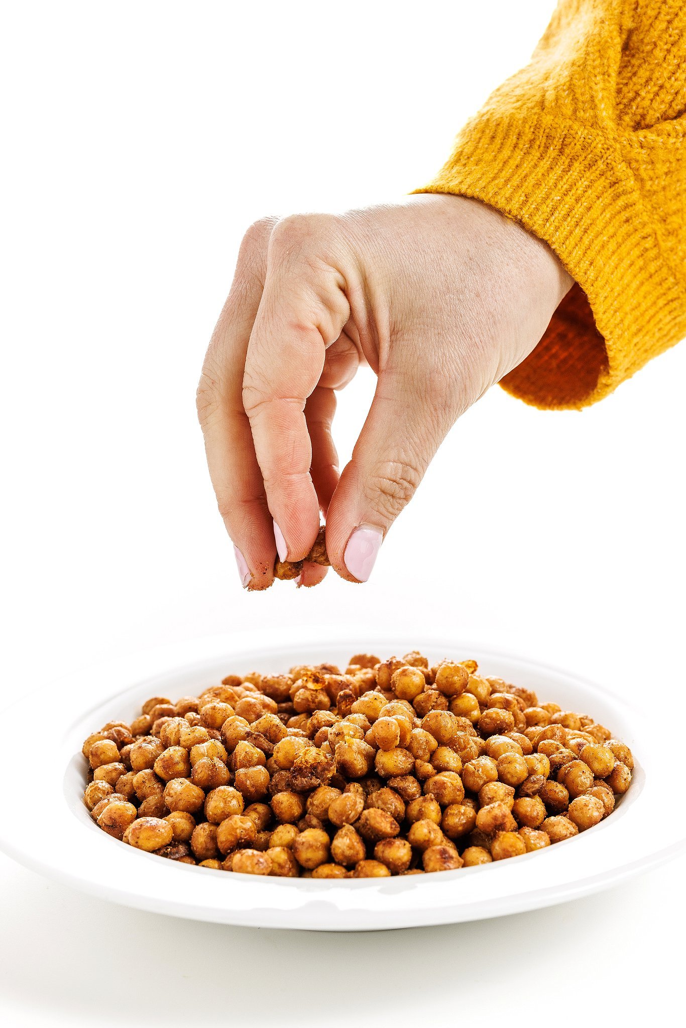 Grabbing oven roasted chickpeas.