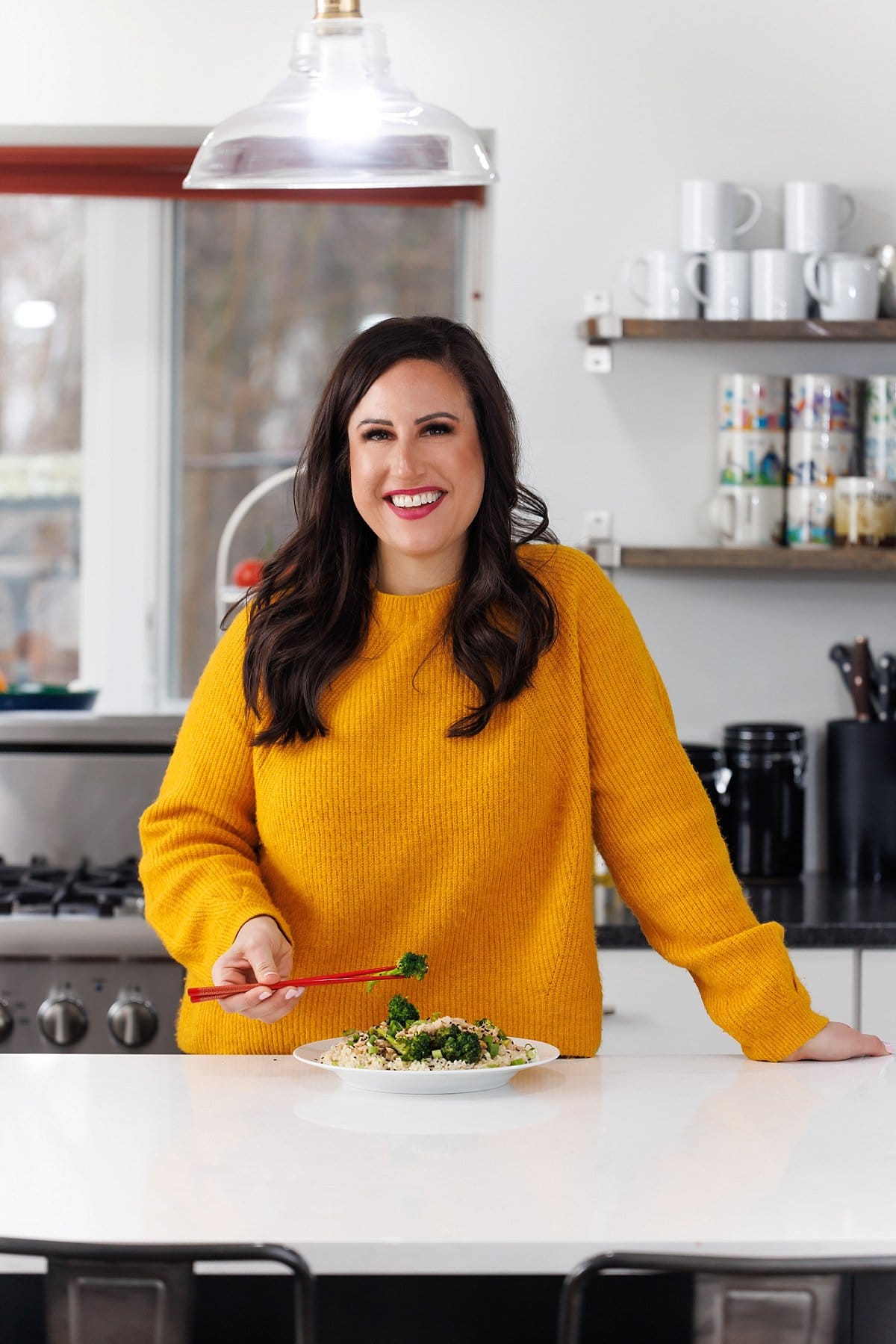 Liz eating brown rice and ground turkey stir fry.