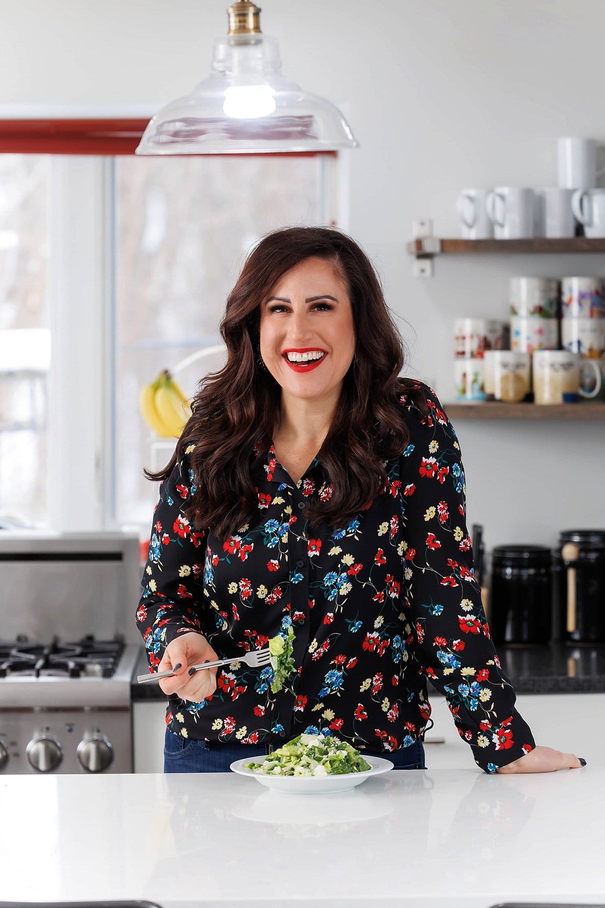 Liz eating Greek herb salad with feta.