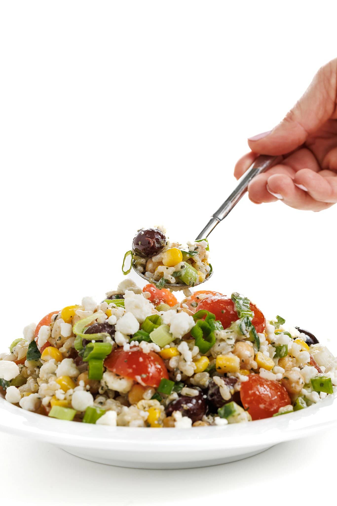Spoonful of Greek brown rice salad.