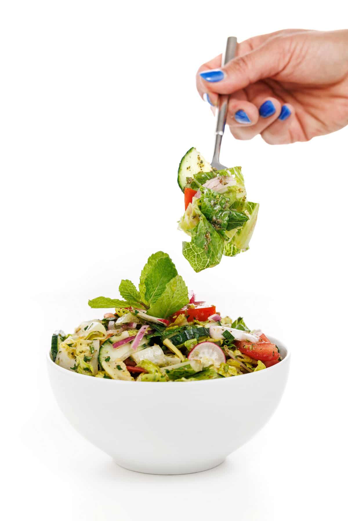 Forkful of spicy Lebanese salad.