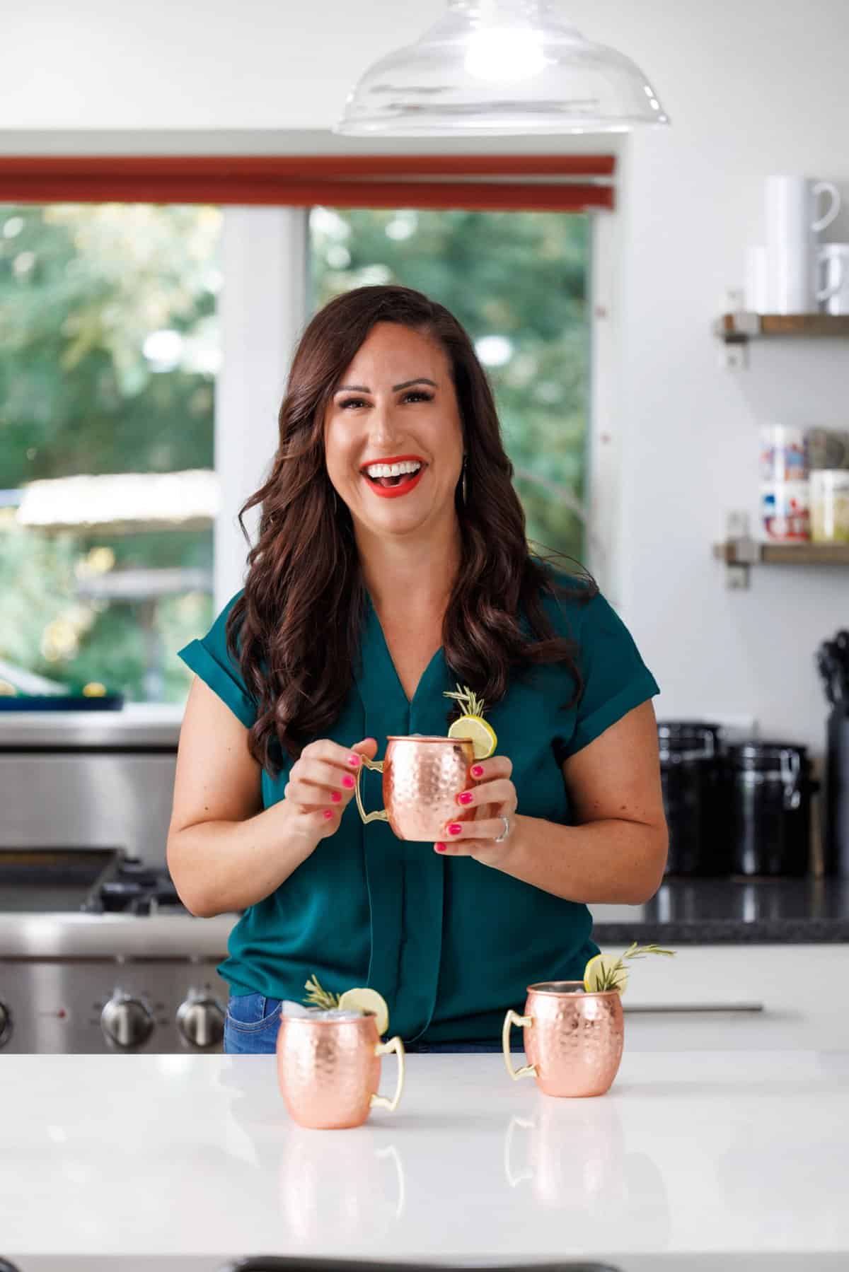 Liz enjoying a rosemary Moscow mule.