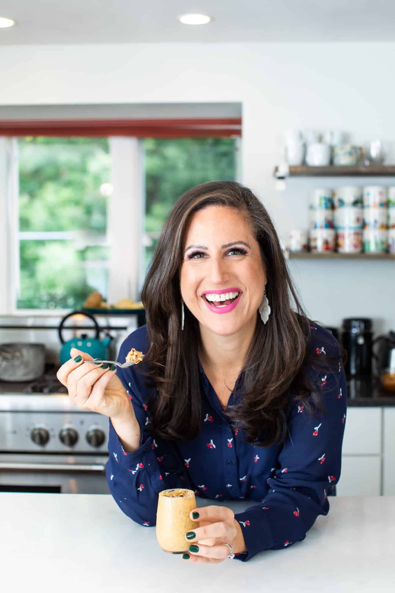 Liz enjoying vegan pumpkin pie chia seed pudding.