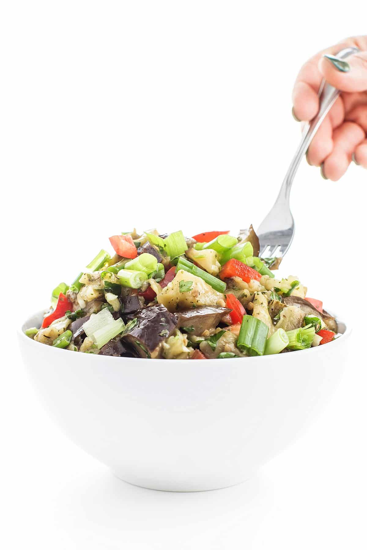 Forkful of Lebanese eggplant salad.