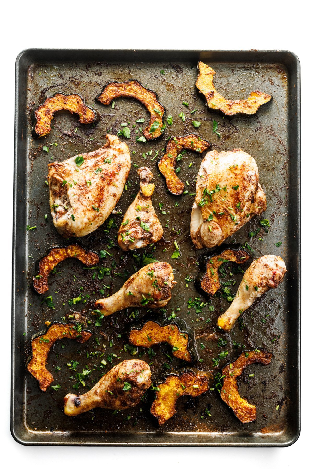 Full view of chicken and acorn squash sheet pan dinner.