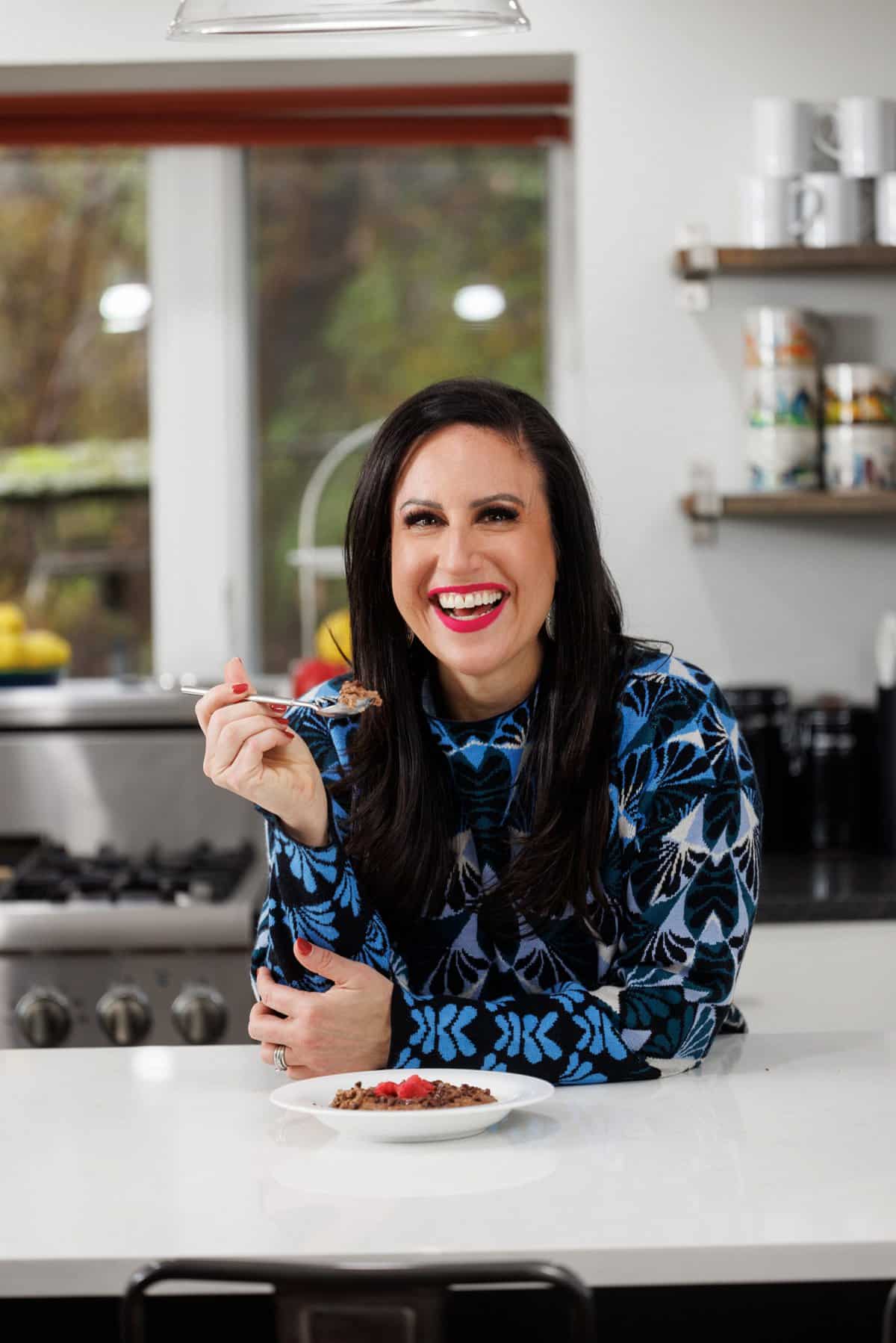 Liz eating high protein chocolate steel cut oats.