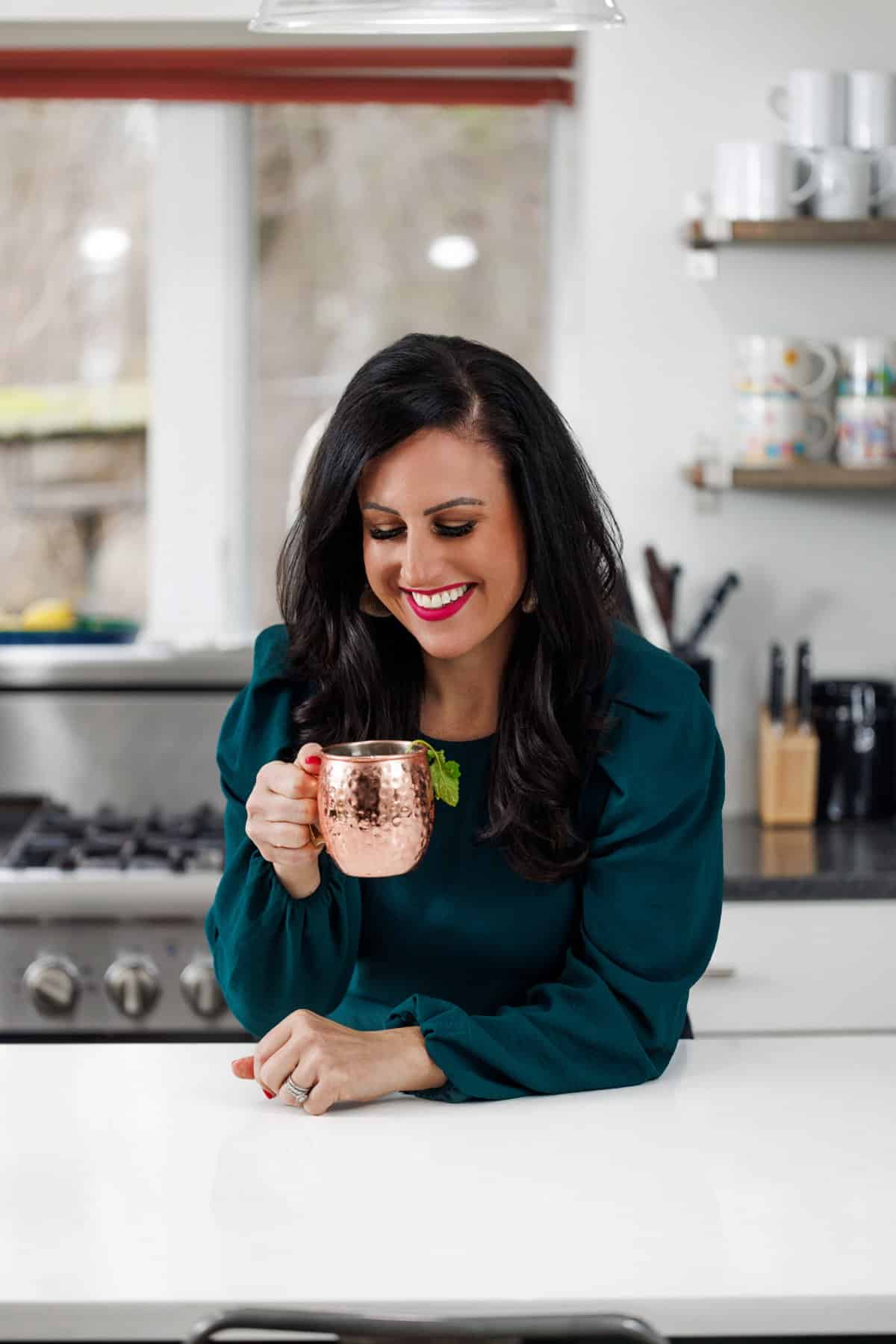 Liz enjoying a strawberry Moscow mule.