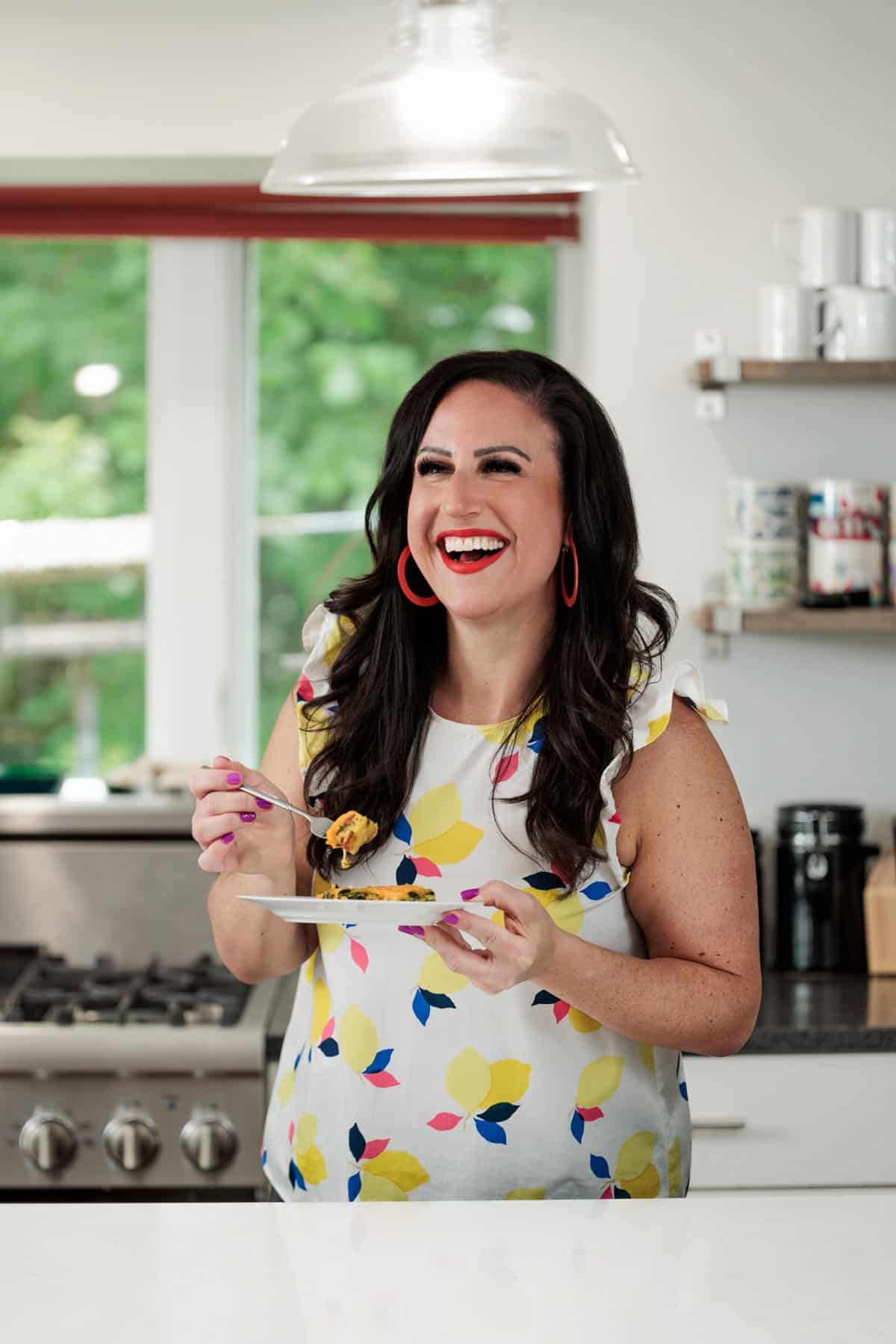 Liz eating low-carb bacon and spinach egg casserole.