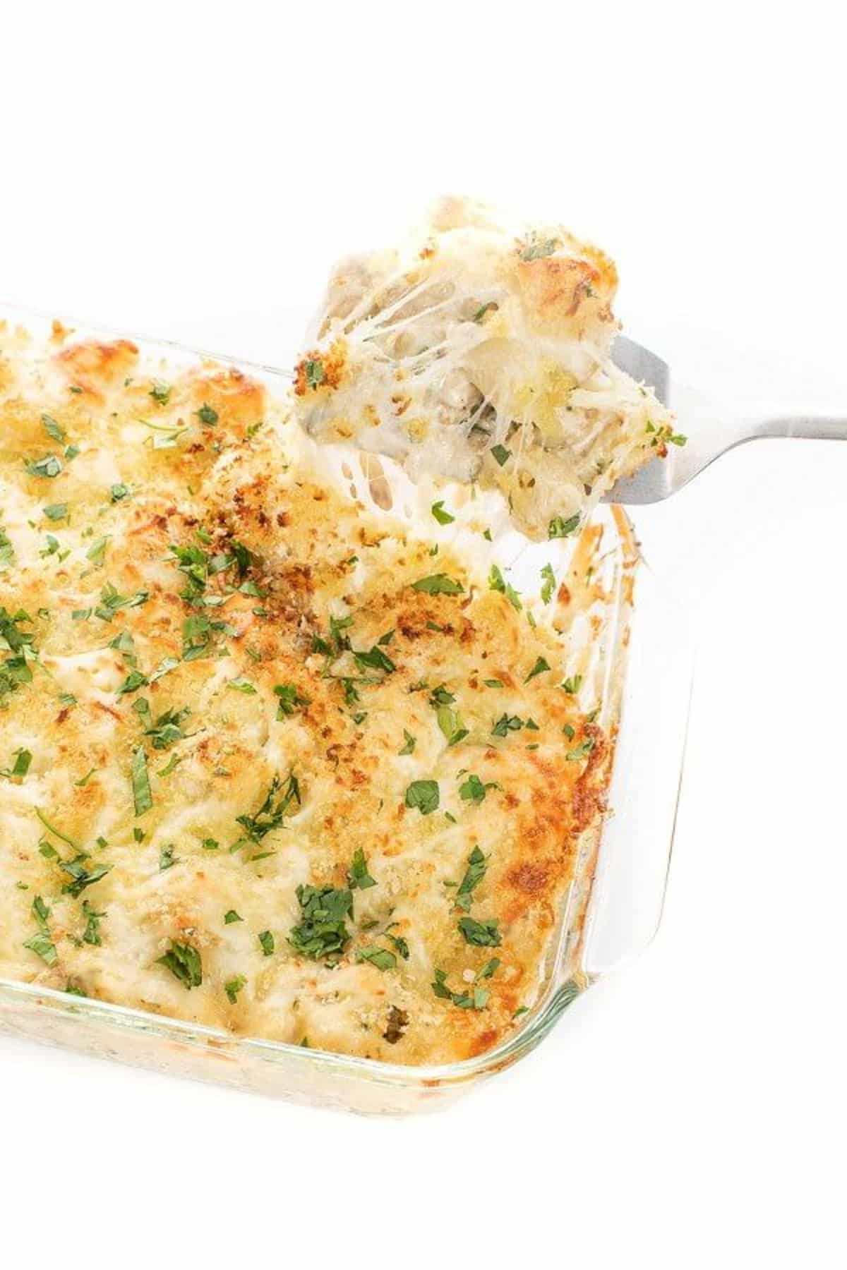 Turkey and mushroom casserole in a glass casserole dish.