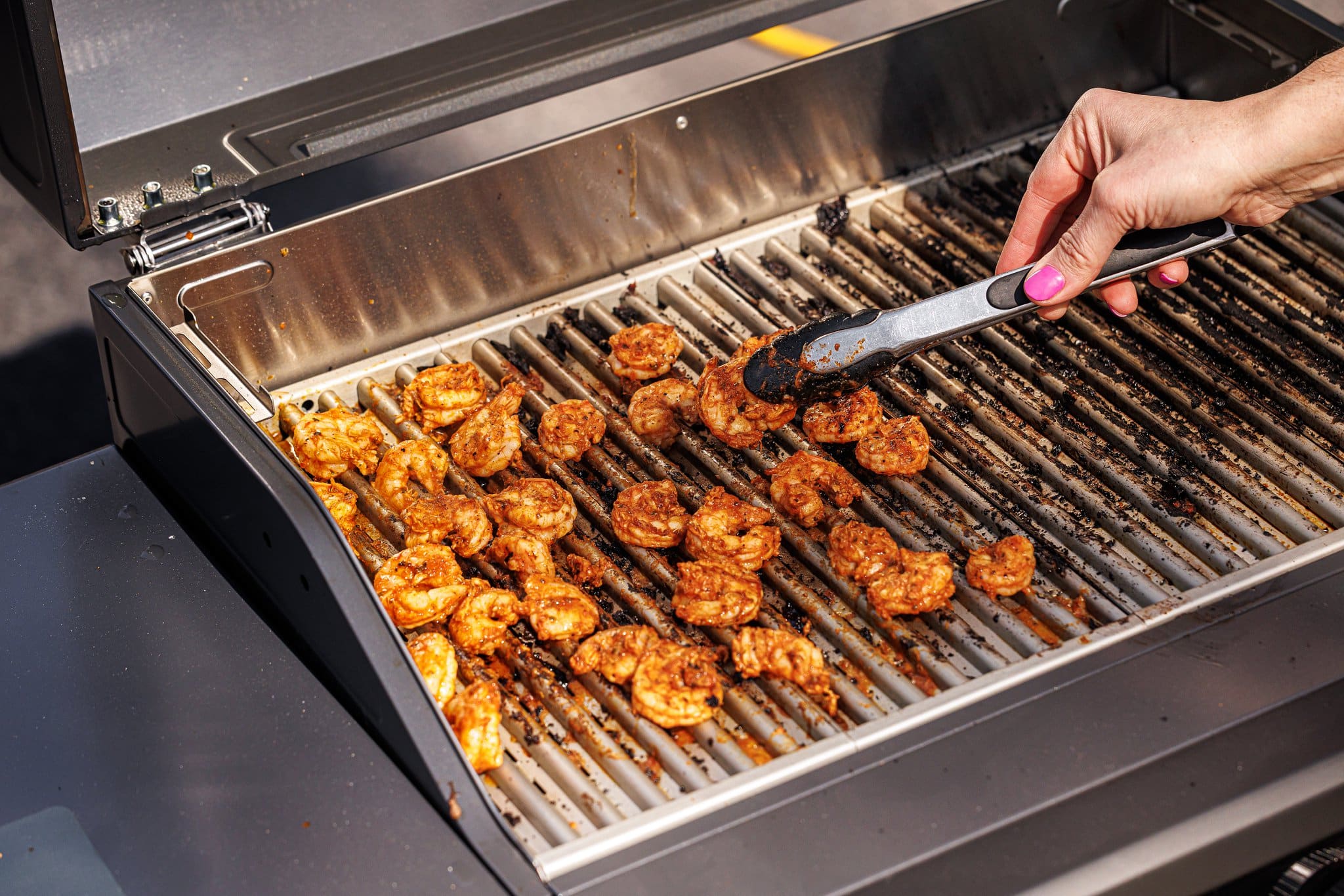 Cooking shrimp on the grill.