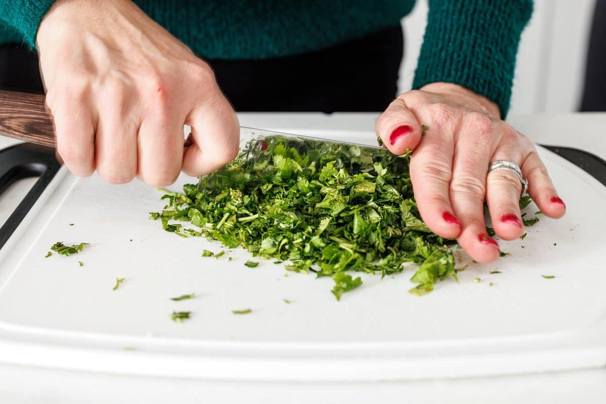 Liz mincing fresh cilantro.