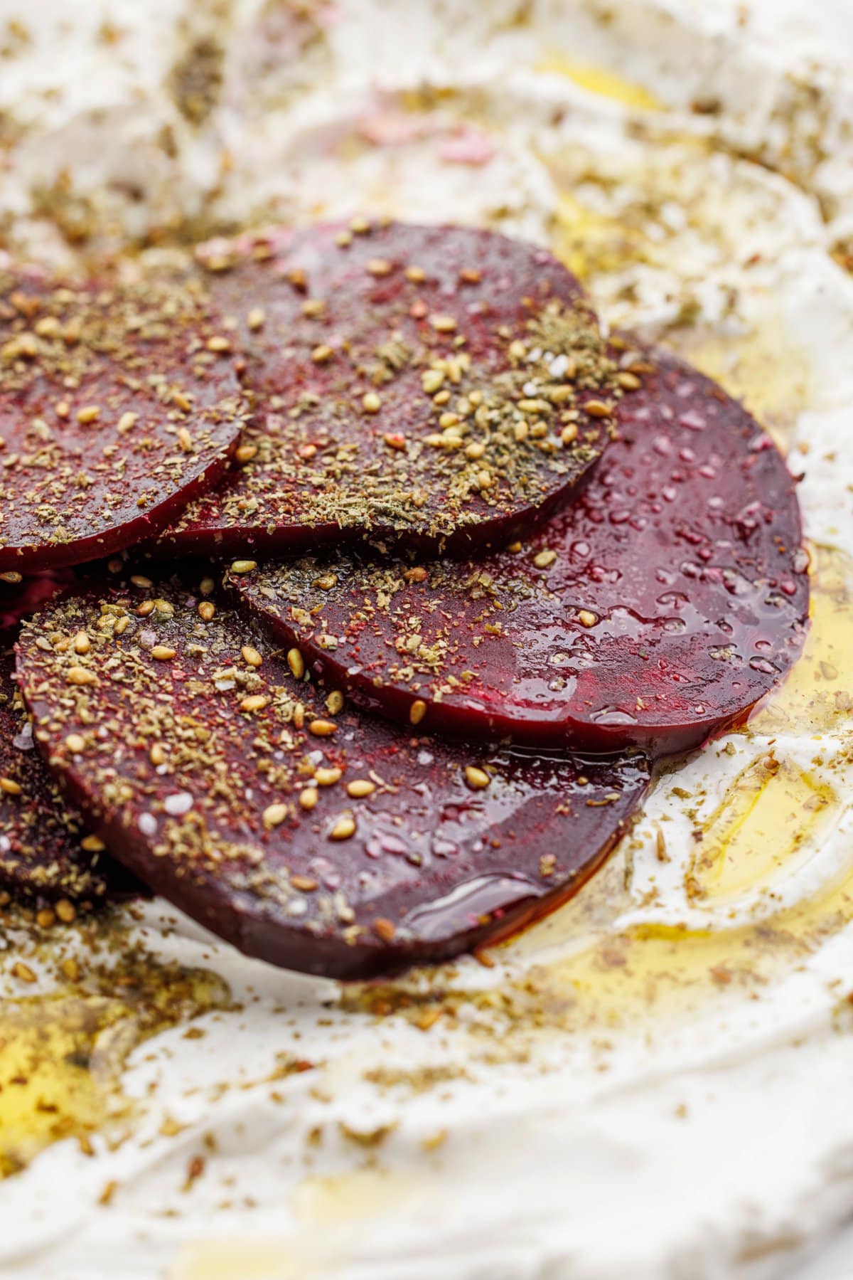 Roasted beets with orange and rosemary garnished with za'atar.