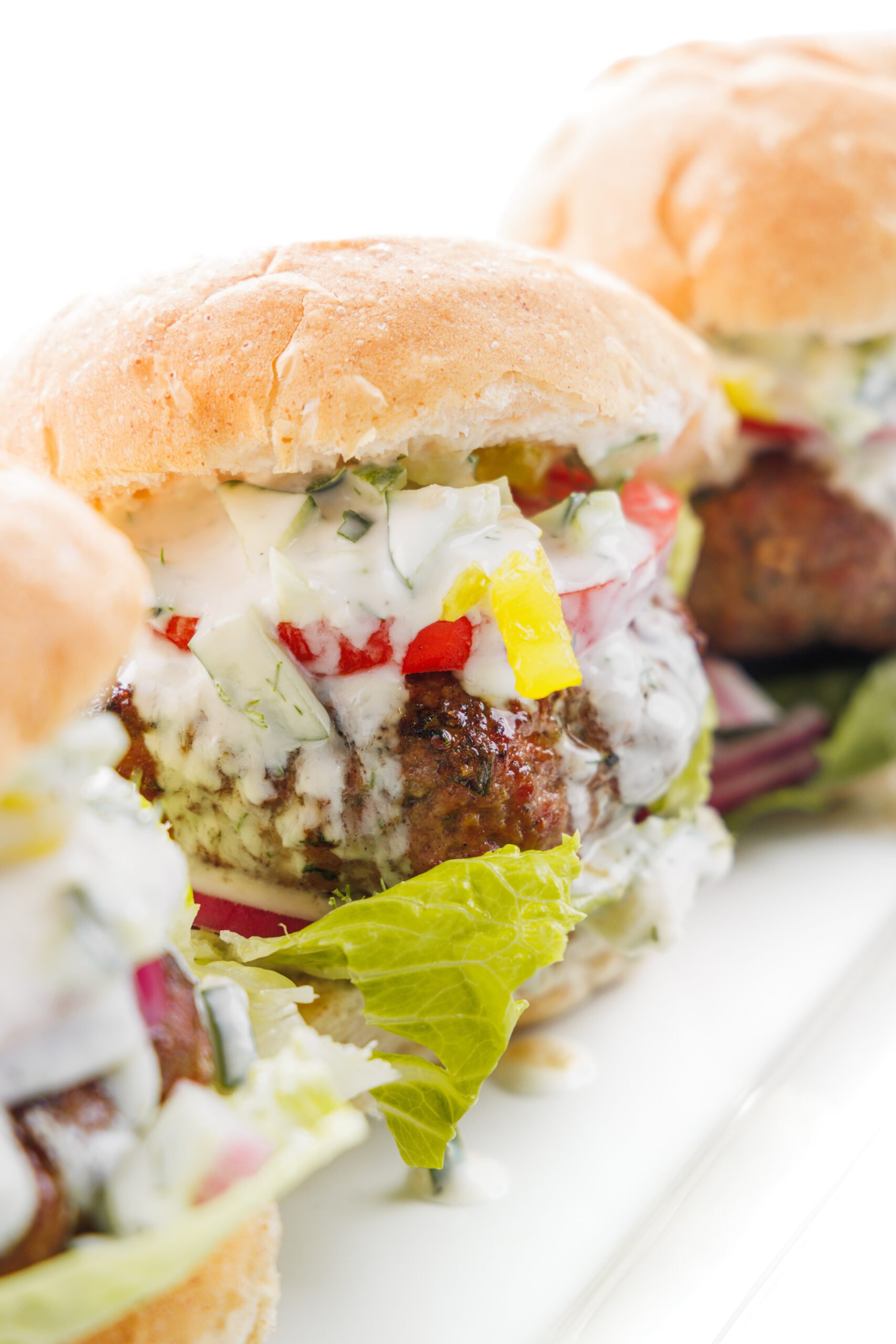 Greek lamb burgers with tzatziki sauce.
