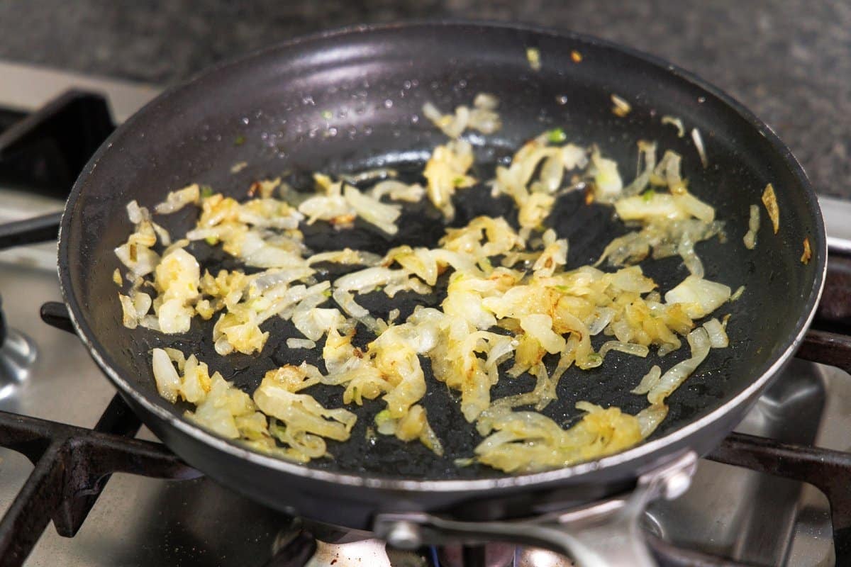 Caramelized onions in a sauté pan.